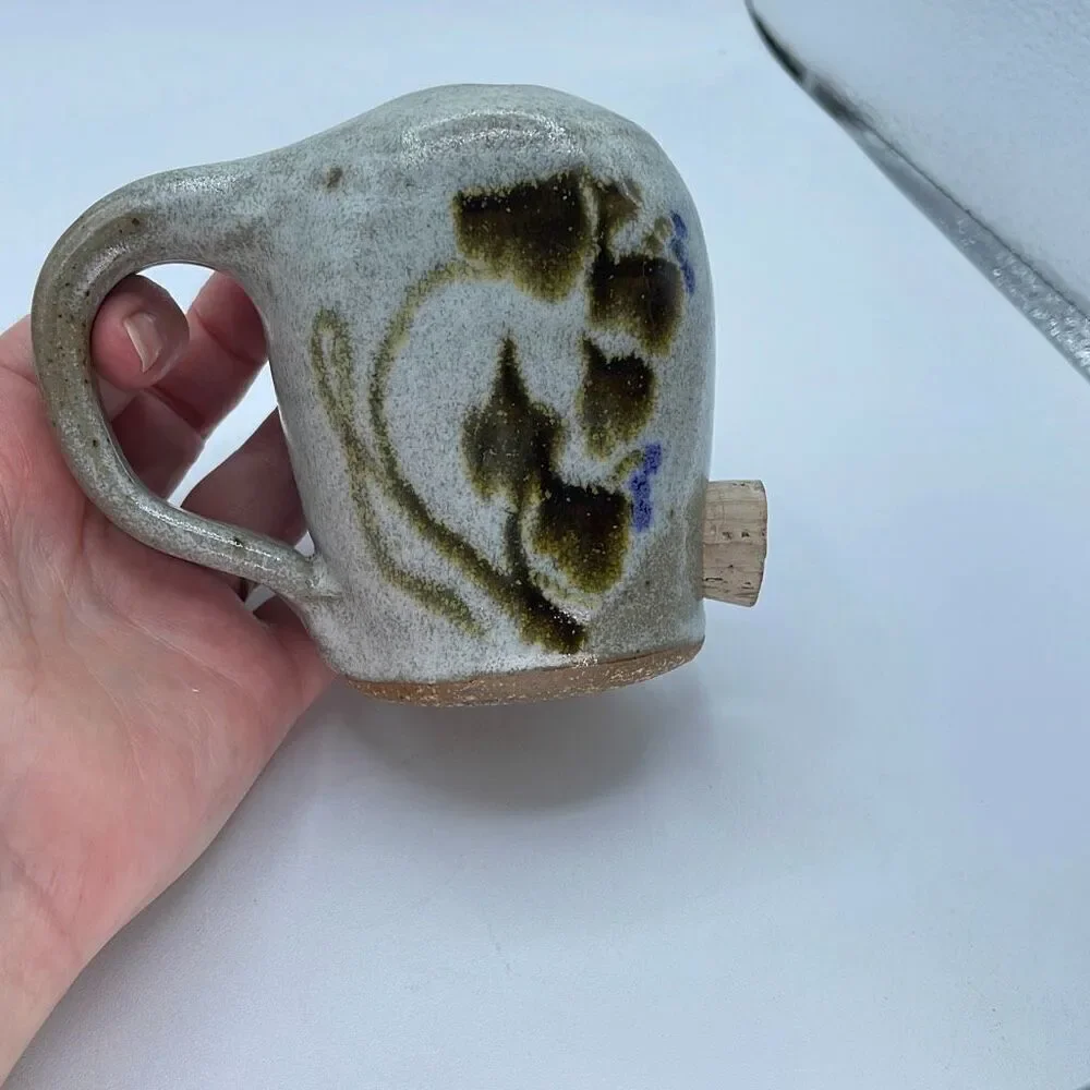 Handmade pottery crockery parmigiana shaker.